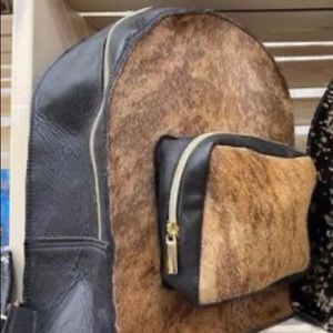 Handmade cowhide leather backpack with front pocket